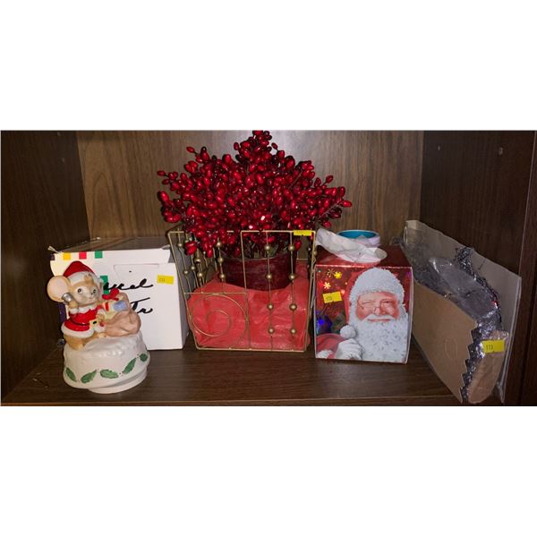 Set of Christmas decorations including a music box figurine, an other sculpture, towels, and more!