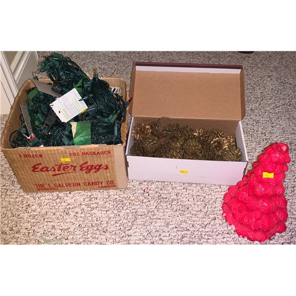 Set of Christmas decorations; fake pinecone box, wax tree, box full of lights