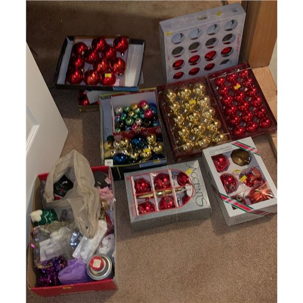 Set of hanging Christmas ornaments, most intact, and a box of holiday candles