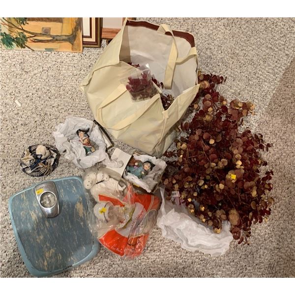 Halloween Decorations including witch sculptures, vintage weighing scale, and artificial shrubbery