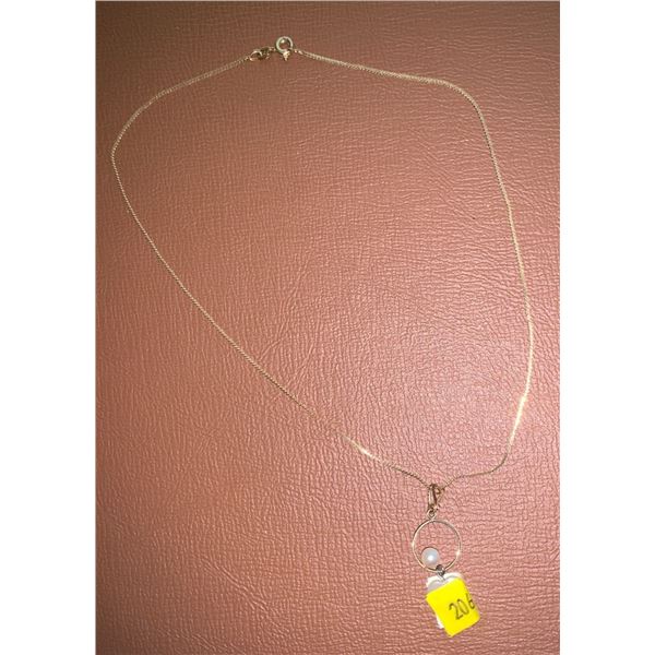 Gold necklace; pendant and chain stamped 10k