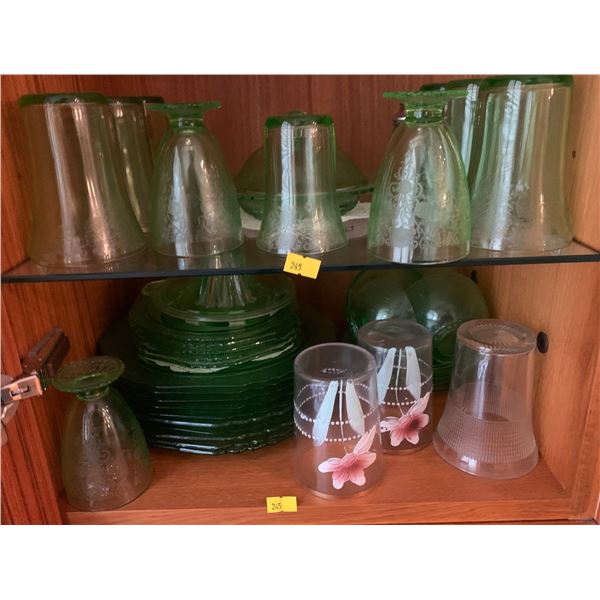 Set of green glasses, plates and other kitchenware. Plus some clear glasses.