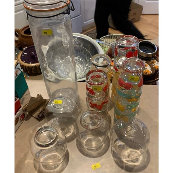 Various kitchen glasses and a glass pasta jar