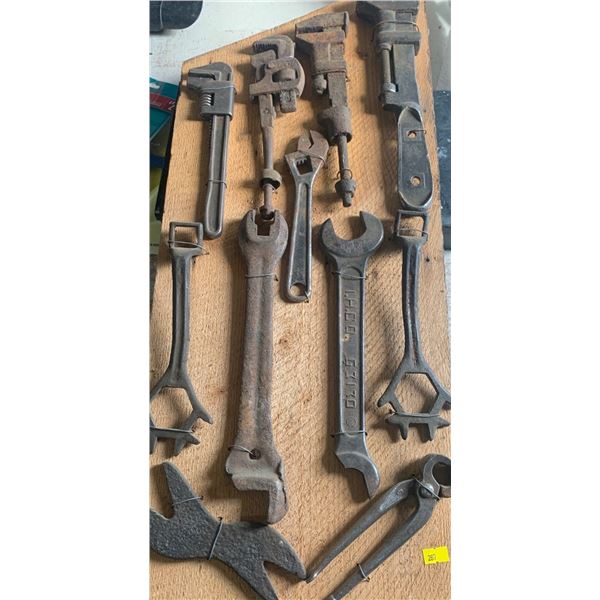 Set of antique tools attached to a wooden board