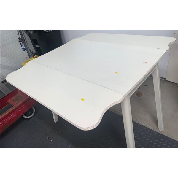 Foldable white table (unfolded 42W, 36D, 30T)