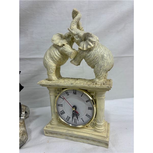 2 Elephant Clocks