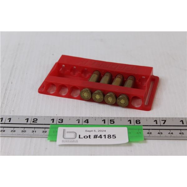 * (4) Winchester 30-30 Caliber Bullets in Holder
