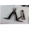 Image 7 : (2) Multi Tools, Pliers, Welders Goggles, Garmin Navigator, Benchmark Retract-A-Bit and Assorted Ite