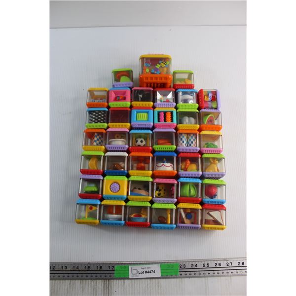 (38) Assorted Cube Kids Toys