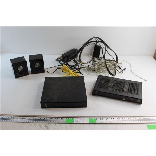 (2) Samsung Speakers, Pace SaskTel Router, Arris Satellite Receiver and Assorted Cords