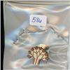 Image 1 : Canadian pin with 9 Maple Leaves. Colourized.
