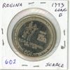Image 1 : 1973 Regina Trade Dollar. Long E in HOME variety. Scarce. Unc.