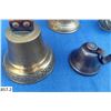 Image 2 : Group of 7 vintage bells, all brass except 1 of them. The bell with the partial leather strap is mar