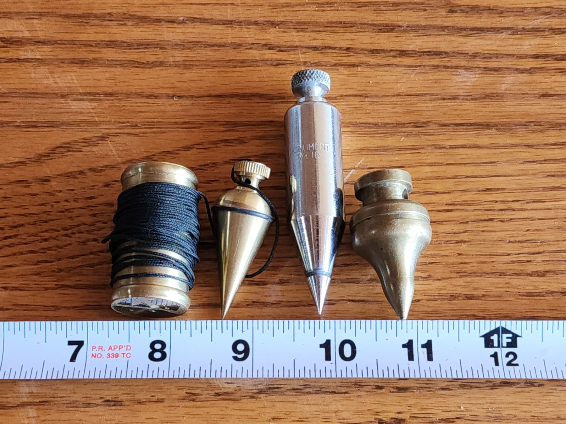 3 Assorted plumb bobs - Schmalz Auctions
