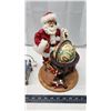 Image 4 : 2 Light up christmas buildings & Santa figurine