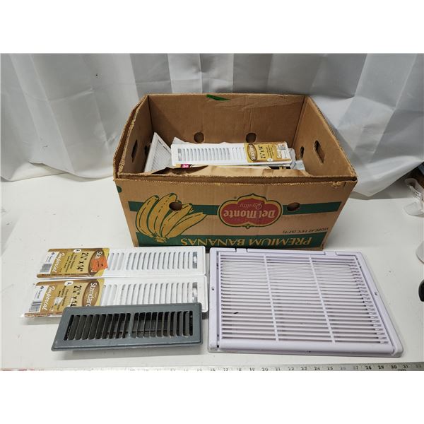 Box of assorted floor registers - some sealed