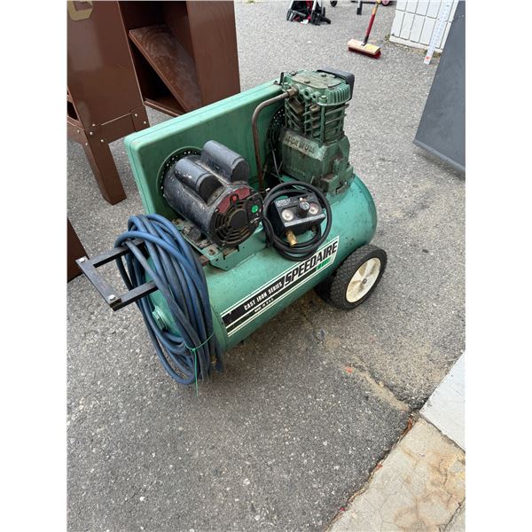 Air compressor with hose