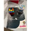 Image 1 : Rubiks cubes and solution book