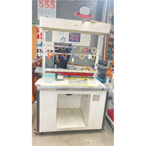 PRINT SHOP LIGHTED MOBILE WORK TABLE WITH ASSORTED MISCELLANEOUS ITEMS