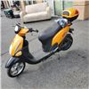 Image 1 : YELLOW/ORANGE GIOBIKES SCOOTER, NEEDS BATTERY, HAS CHARGER AND KEYS
