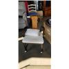 Image 1 : VINTAGE SITTING CHAIR ON CASTERS