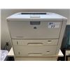Image 2 : HP LASERJET 5200DTN COMMERCIAL LASER PRINTER ON A MOBILE STAND WITH HALF A BOX OF PRINTER PAPER