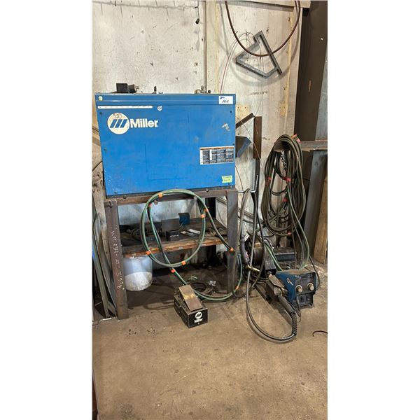 MILLER DELTAWELD 452 WELDING POWER SOURCE ON  STEEL STAND WITH MILLER 22A 24V WIRE FEEDER