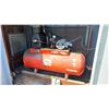 Image 1 : DEVILBISS 4464 ORANGE INDUSTRIAL AIR COMPRESSOR * LOCATED IN SHED BEHIND VEHICLES *