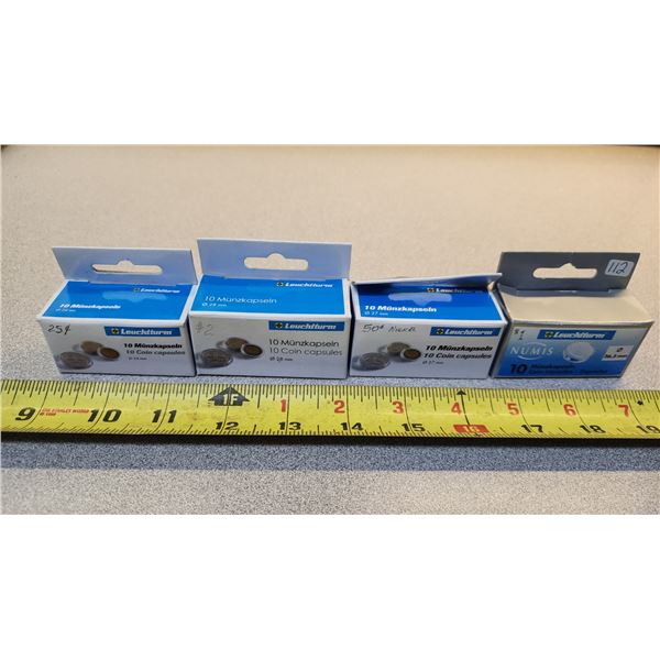 4 Boxes of plastic coin capsules - 24, 26, 27 & 28mm