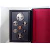 Image 2 : 1986 Proof Set. 7-coin set includes Silver Dollar that commemorates the 100th Anniversary of the fou