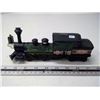 Image 1 : Avon train. Black on dark green glass. Plastic cowcatcher. 8 ½” long.