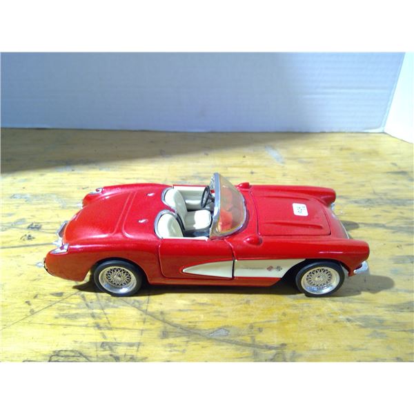 Die Cast 1957 Corvette conv. Hood and Door open Model # SS7708