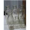 Image 2 : Crate with 6 milk bottles