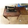 Image 1 : Singer electric sewing machine w/ manual and other stuff