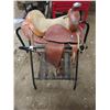 Image 1 : beautiful pony saddle and stand great condition