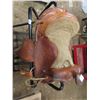 Image 2 : beautiful pony saddle and stand great condition