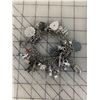Image 1 : VINTAGE 1970S STERLING SILVER CHARM BRACELET AND MANY STERLING CHARMS