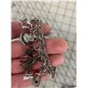 Image 6 : VINTAGE 1970S STERLING SILVER CHARM BRACELET AND MANY STERLING CHARMS
