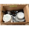 Image 2 : Pots, pans and a spice rack.