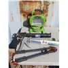 Image 1 : bolt cutters , caulking gun , light