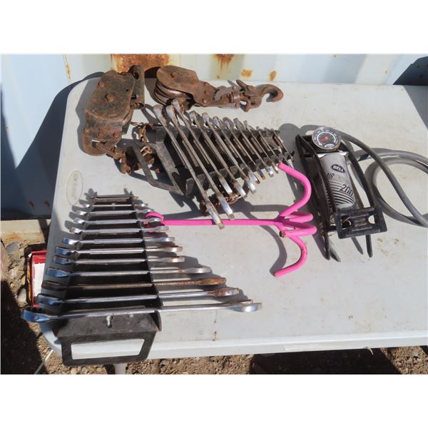 tote with wrenches , pulley hoist , hook , misc