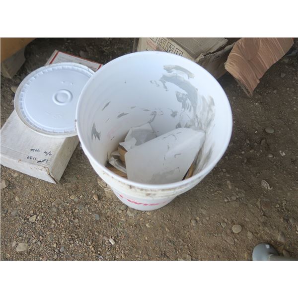 pail with 6 rolls of putty tape