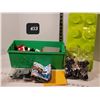 Image 1 : Green Lego brick filled with Lego from various kits.