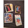 Image 8 : Sports lot. Basketball cards, baseballs, football stands, puck, boomerang.