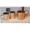Image 1 : Copper Moscow Mule cup. 2 Smirnoff mugs.