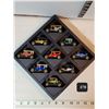 Image 1 : 9 die cast cars in display.