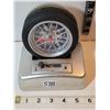 Image 2 : Unique rolling tire alarm clock. Shifting sound & says Good morning when stopped.