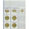 Image 1 : Page of Collector's gold panda coins - cannot verify if pure gold. Possibly gold plated.