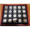 Image 1 : Lot of 20 Canadian Silver Dollars from 1935 to 1967. Housed in hard plastic holders inside a fancy w