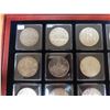 Image 2 : Lot of 20 Canadian Silver Dollars from 1935 to 1967. Housed in hard plastic holders inside a fancy w